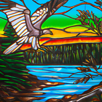 Stained Glass style, design a stained glass window of a river scene with Bunjil the wedge tail eagle gliding above a river lined with trees and grasses. there is an aboriginal campfire by thewater